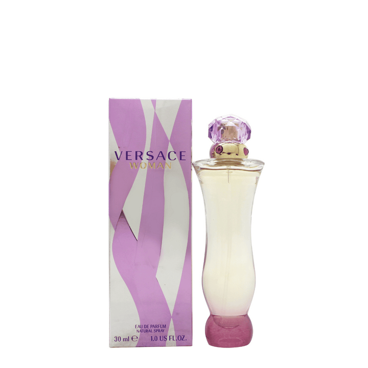 Versace Woman Eau de Parfum spray med en träig doft.